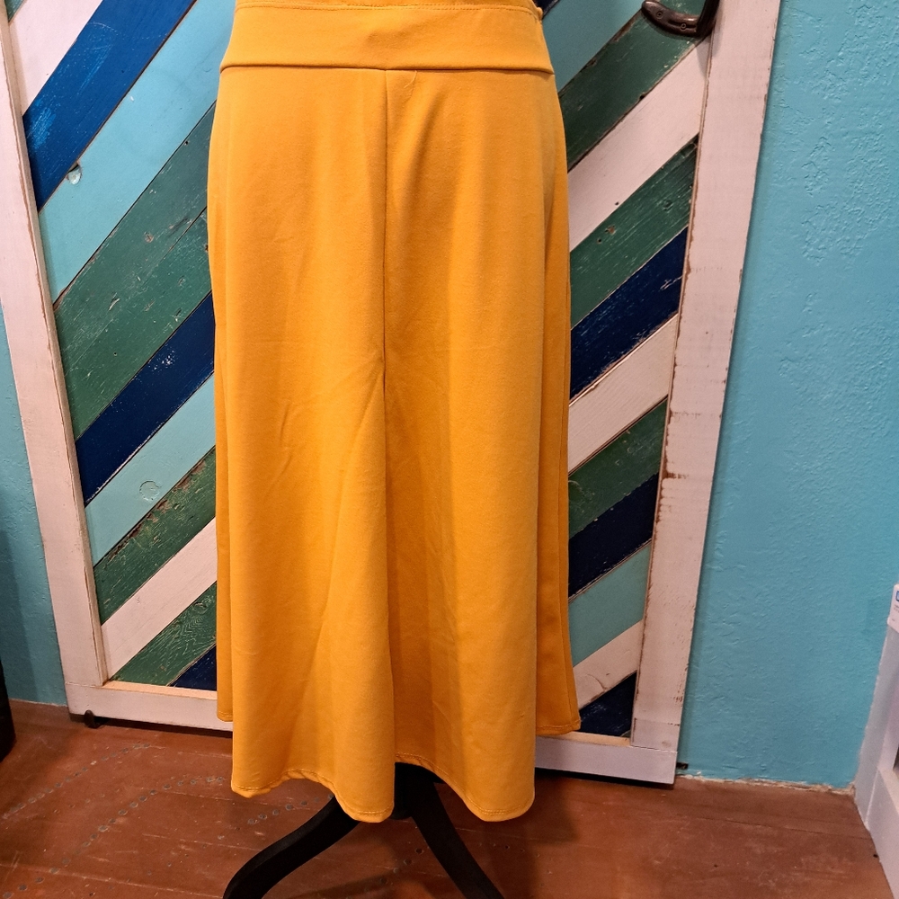 Double Take skirt, mustard color, size large.